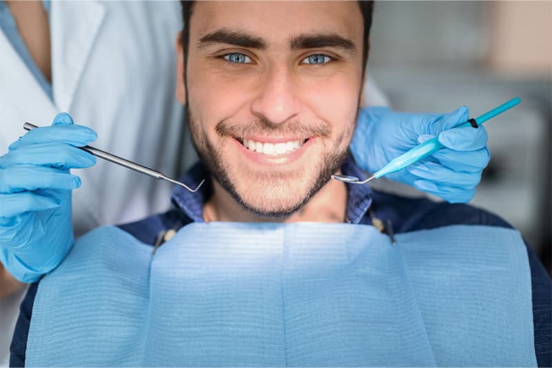 Person smiling showing healthy teeth